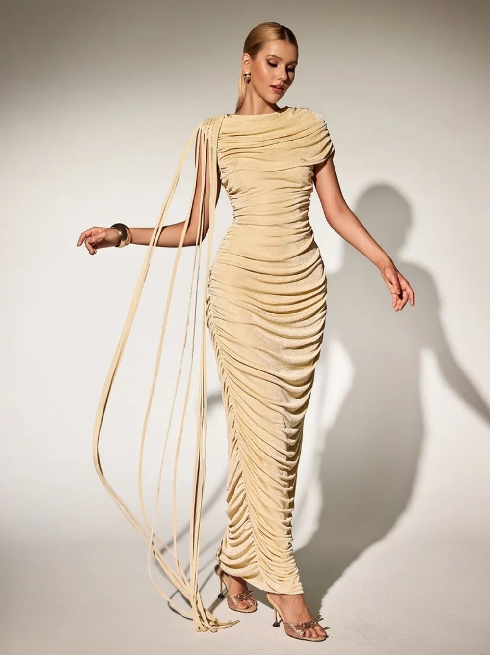 Beige Ruched Draped Maxi Dress with Long Fringe Detail.